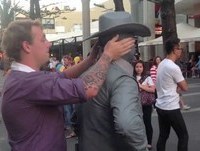 Guy gets punched by street performer! (Original)