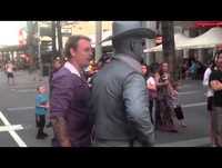 Guy get punched by human statue