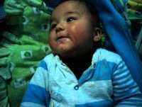 Bebê risonho com 5 meses