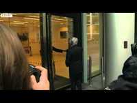 Bernie Ecclestone fails to get through a door